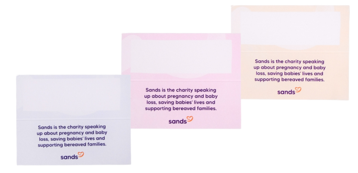 wedding favour cards in 3 colours. Pale orange, pink and blue.