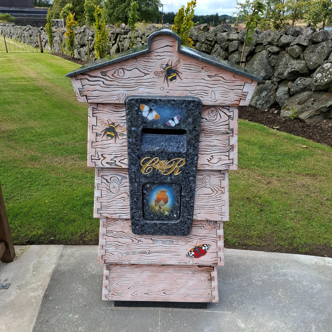 Image of Beehive Postbox at Forget Me Not Garden