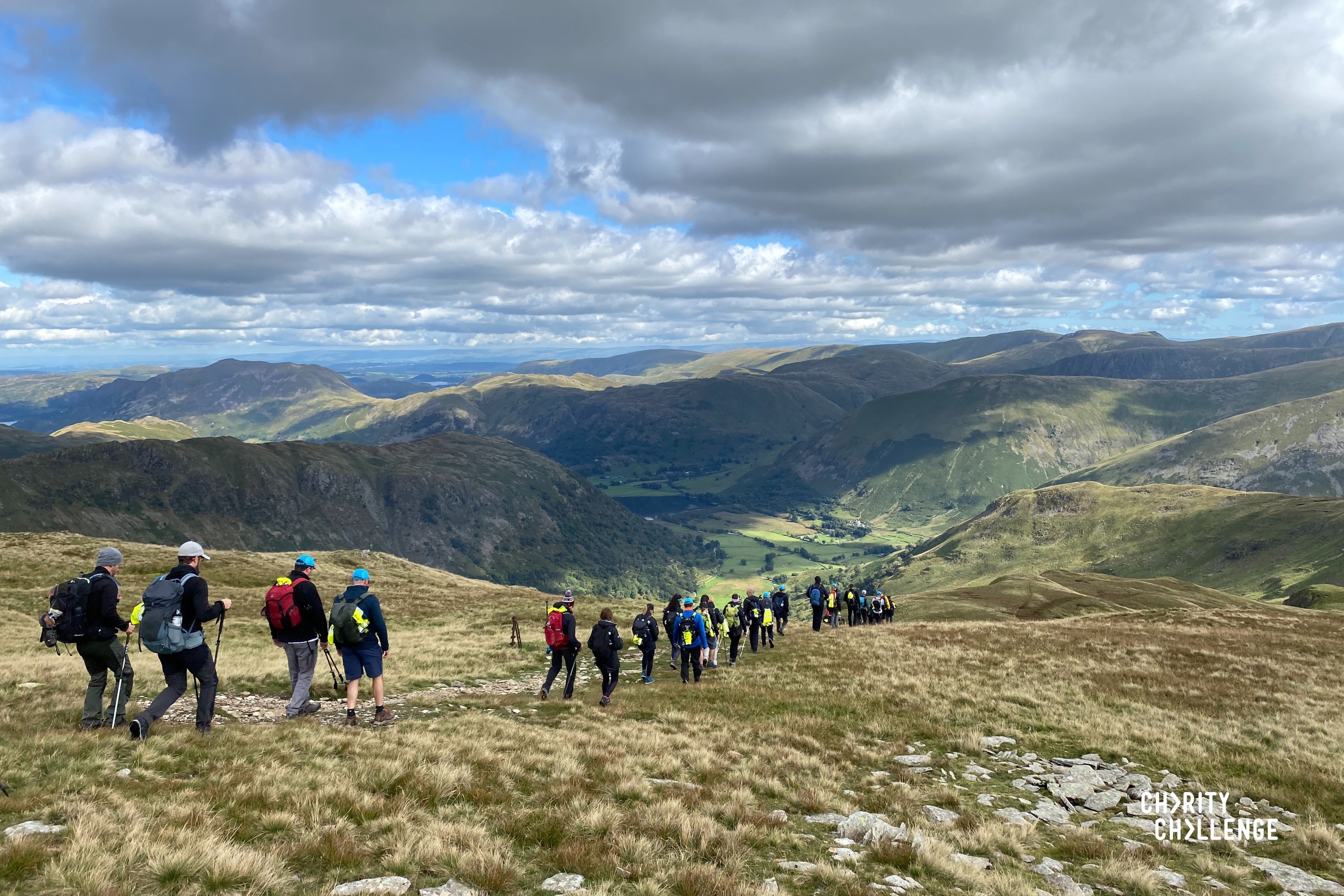Group of trekkers climbing a mountain
