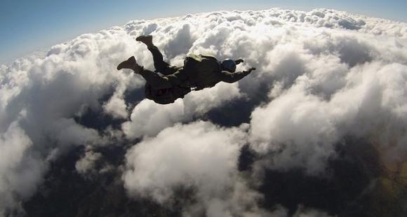 Skydiver pictured in the sky from above