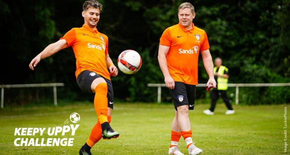 two players doing keepy uppies