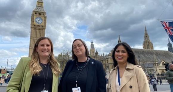 Three Sands campaigners standing in front of the Houses of Parliament in Westminster.