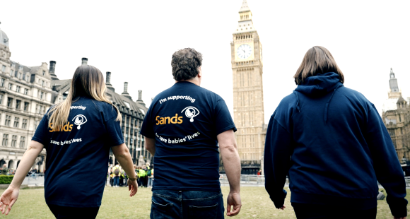 A group of Sands campaigners walking towards the Houses of Parliament in London.