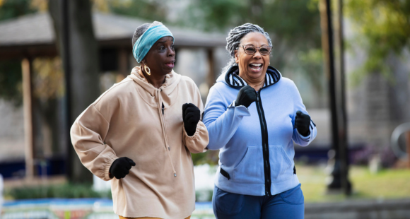 Two ladies running outside