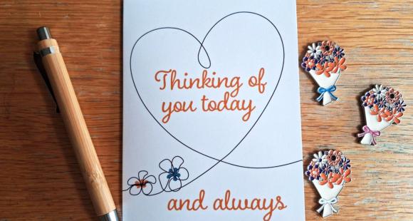 thinking of you card wit 3 tokens next to it