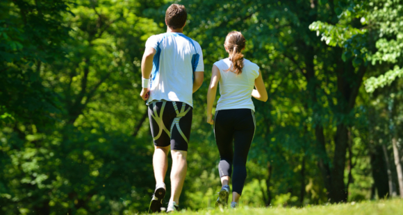 Run 50k in May - two people running in the background