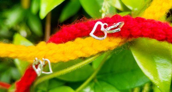 red and yellow rakhi bracelets
