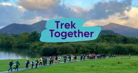 Trek Together with walkers in the background
