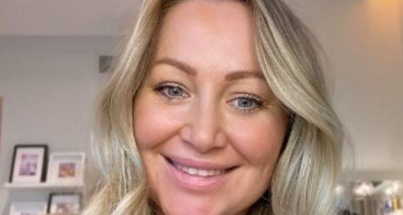 Lady with long blonde hair smiling at the camera