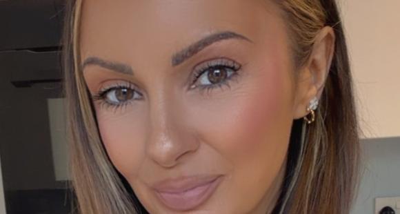 Girl with brown hair looking into the camera