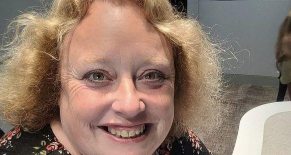 A lady smiling at the camera 