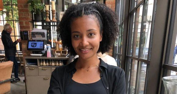 A lady smiling at the camera