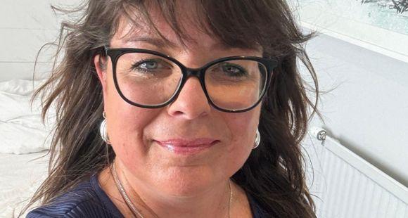 Carolyn smiling at the camera