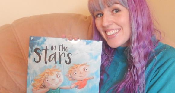 Sam Kitson with her book "In the Stars"