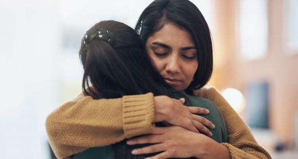 South Asian women hugging