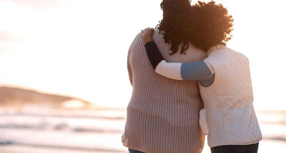 two black women hugging