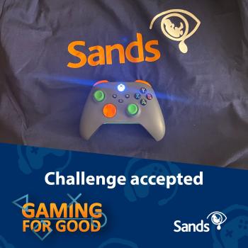 Challenge accepted tile with Sands t-shirt, a games controller