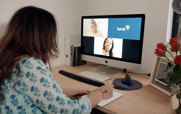 image of Sands staff on screen call consulting with women