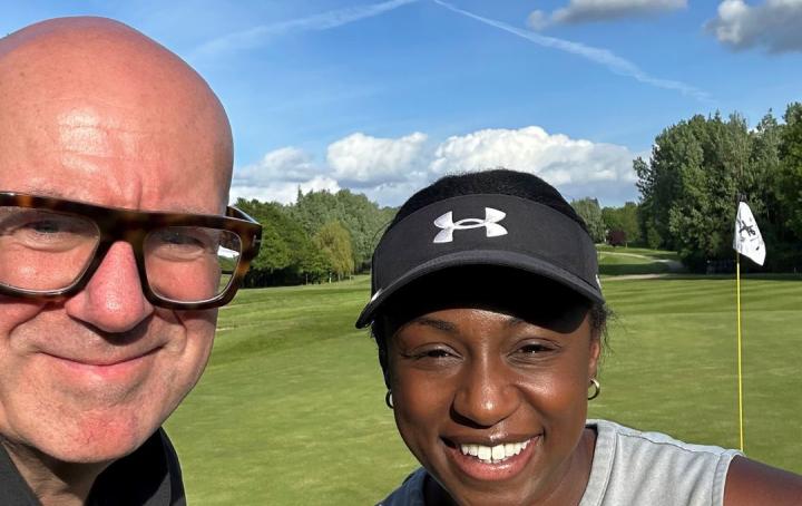 Image of Mike and Genelle on the golf course 