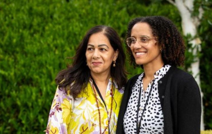 Jordan is stood with Madhuri at Sands Garden Day