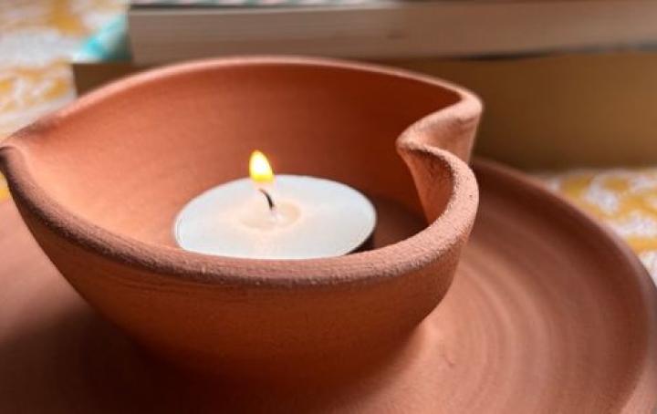 A heart-shaped diya