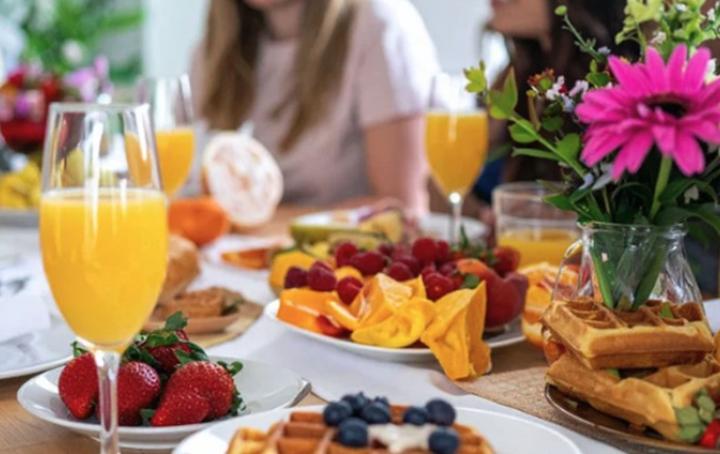 Brunch table of food and drinks