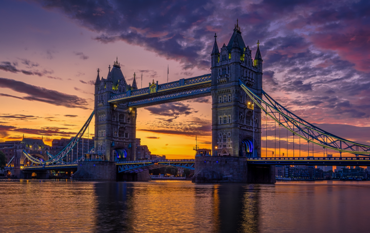 Image of Tower Bridge the river thames with dusk in the horizan