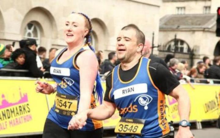 two Sands runners holding hands whilst running the london landmarks route